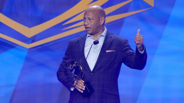 Team USA swim coach opens up about lessons learned from his father