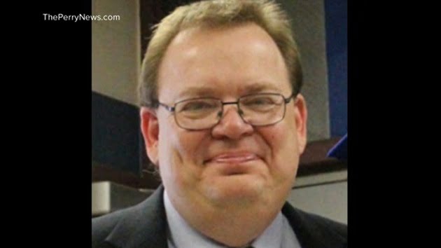 Iowa high school principal who was shot while trying to protect students dies from his injuries
