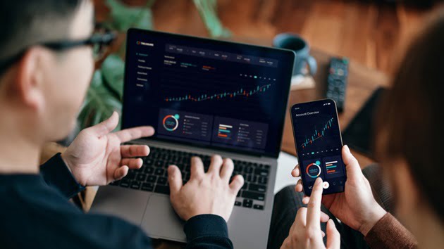 Dow closes above 38,000 for 1st time ever, setting record high