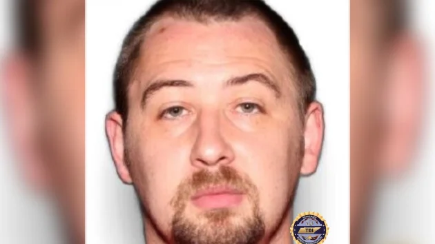 As search for prime suspect goes on, 2 more people charged in Tennessee quadruple killing